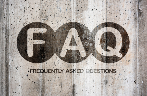 Cement wall with the letters F, A, Q with the words Frequently Asked Questions underneath.